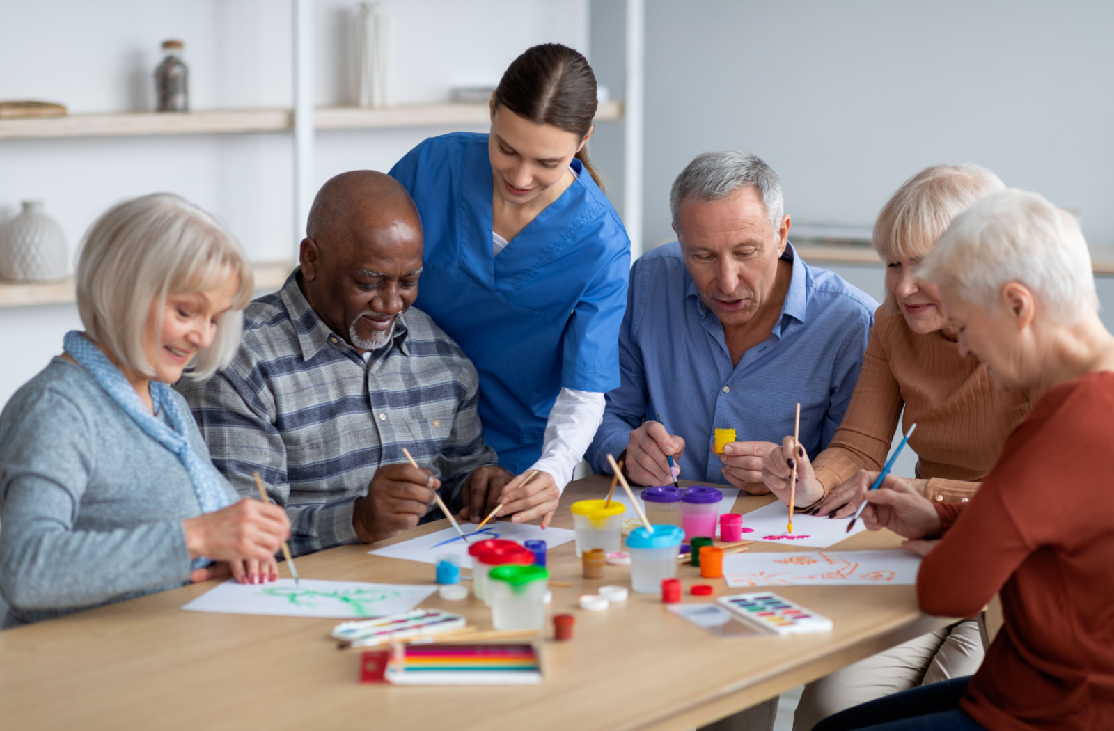 Seniors and staff enjoying activities in a supportive Adult Day Care setting